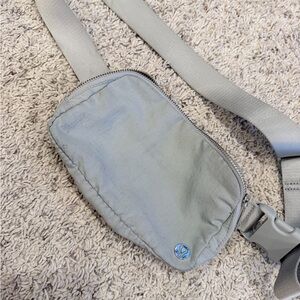 Light gray lululemon belt bag